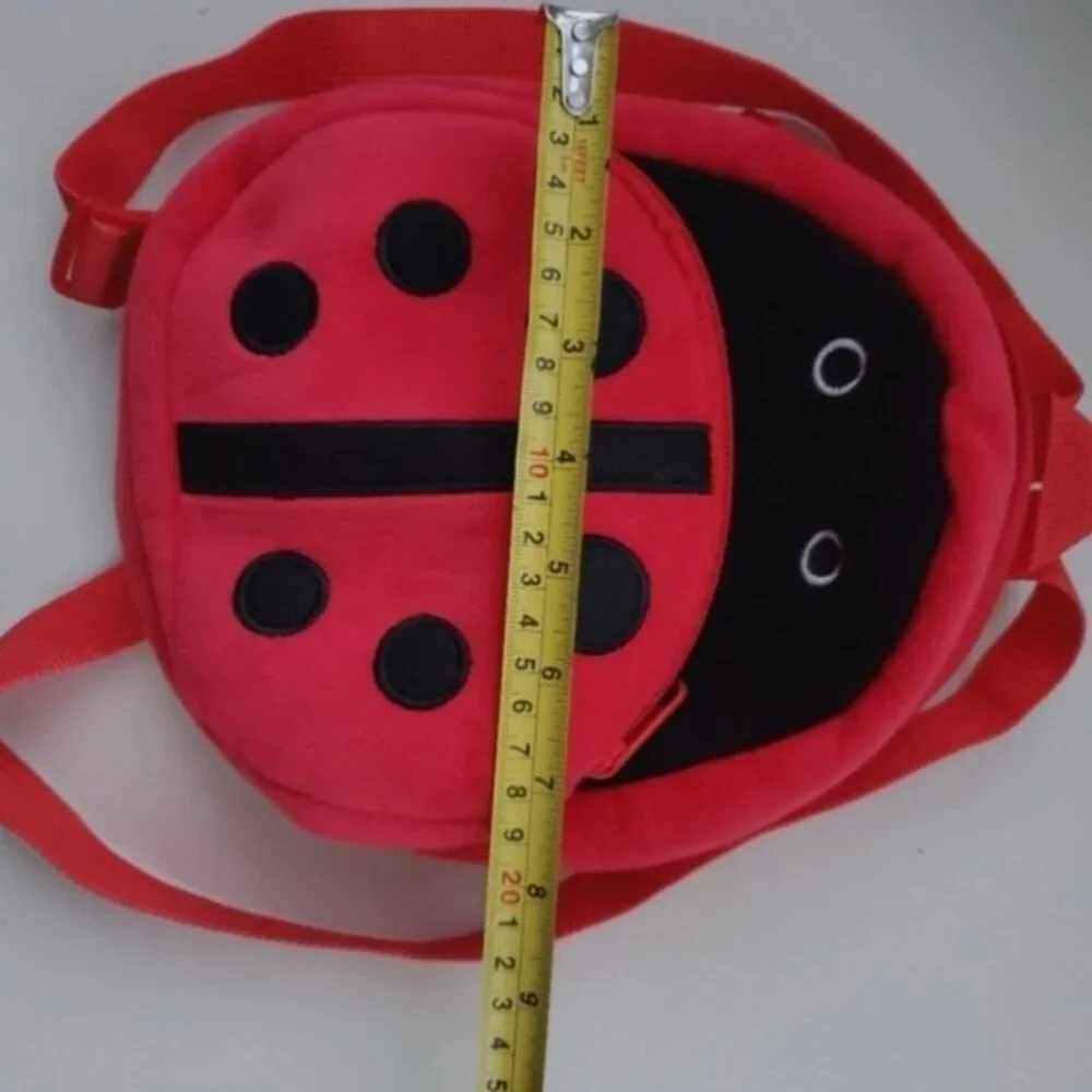 Ladybug plush fabric backpack